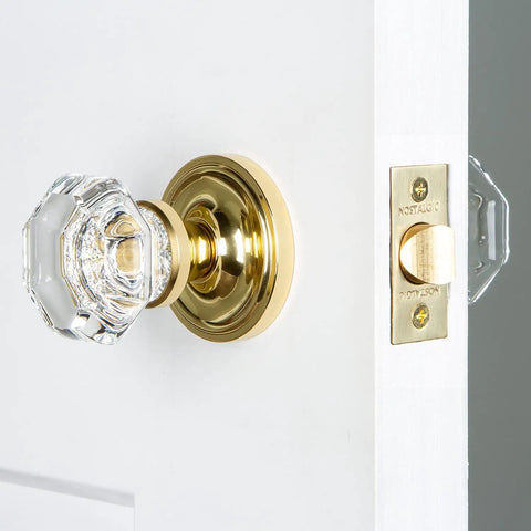 Classic Rosette Waldorf Octagonal Crystal Door Knob With Old School Charm And Elegant Vintage Style shown on white door