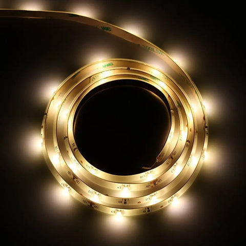 Warm glowing Motion Activated Bed Light With Flexible LED Strip for nighttime navigation