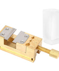 Brass Watch Repair Vise Clamp Kit With 0.2-1.5mm hole range showing copper clamp and adjustment screw for horology.