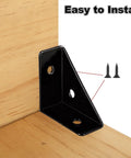 40 Pack Bulletproof Stainless Steel Corner Brackets For Wood Furniture Assembly Rust Resistant Triangle Angle Connectors Heavy Duty black metal L brace installed on a wooden corner.