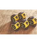 Five yellow and black tape measures of various sizes on wooden surface, indicating a collection of FatMax Tape Measure 1-1/4 Inch By 30 Foot.