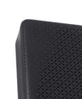Keep Your Network Alive With This Rock Solid Mini UPS Battery Backup Packing 20800 mAh Capacity close-up of textured black surface.