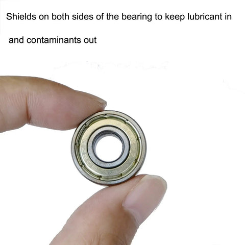 Close-up of a 608-ZZ ball bearing with double metal shielding, part of a pack of 50 for skateboards and scooters for smooth rolling.