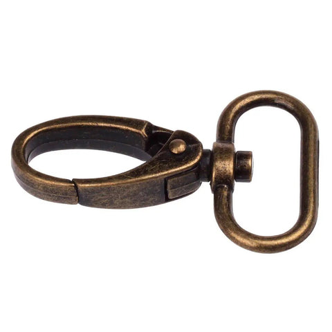 Dead Nuts Sturdy Curved Zinc Alloy Swivel Trigger Clasps For One Inch Webbing Bag Hardware Pack Of Twenty Featuring A Smooth Antique Brass Finish.