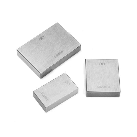 Three high precision gauge blocks labeled 20mm, 30mm, and 50mm made of heat treated hardened steel for accurate measurements.