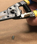 Close-up of wire stripper from Go To All In One Electrical Tester Kit With Digital Multimeter, Non Contact Voltage Pen, Receptacle Tester, And Wire Stripper Cutter, 4 Piece Pro Set For Quick Safe Electrical Checks.