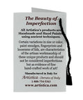 Tag explaining the beauty of handmade imperfections in Artistica's handcrafted Italian ceramic coffee storage canister.
