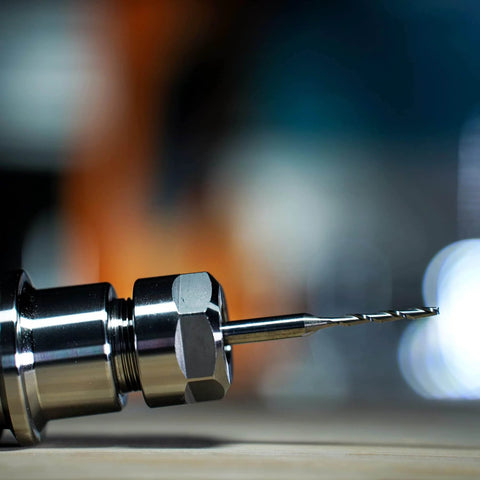 Close-up of a Five Piece Spiral Upcut Router Bit Set With One Eighth Inch Cutting Diameter And One Quarter Inch Shank For Woodworking And CNC Projects