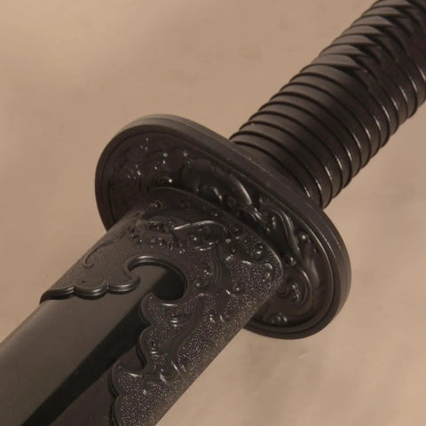 Close-up of hilt on Beefy Polypropylene Practice Sword For Martial Arts Training, Safe Bokken Style Samurai Sword With Durable One Piece Blade.
