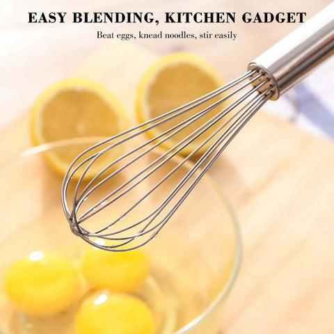 Close-up of Go-To Stainless Steel Balloon Whisk in action with eggs, highlighting rust-resistant 12-inch whisk for cooking.