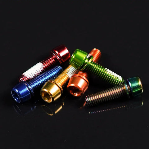 Multicolor CNC bike stem bolts featuring orange, made from high-strength steel alloy for BMX, MTB, and road bikes.