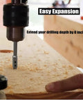 Ten Inch Alloy Steel Forstner Bit Extension Rod For 3/8 Inch Drills being used to extend drilling depth on wood.