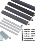 Sandpaper rolls, knife stones, and polishing block included in 27 Piece Modeler Tools Craft Set For Miniatures Mecha Cars And Robots Ideal For Hobby Builds With Cutting Pad Knife Blades Steel Ruler Pliers Tweezers And More.