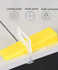 Pro Grade Tile Leveling System Kit With 600 White Spacers And 200 Red Wedges Plus Pliers For One Eighth Inch Stone And Tile Installations showing yellow wedge used for leveling tiles