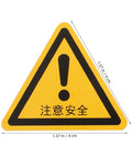 Close-up of 24 Pack Yellow PVC Safety Warning Sign Stickers For Machines And Equipment, Self Adhesive And Weather Resistant.