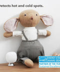SmartSensor 2-Pack for Temperature and Occupancy Detection white sensor on stand beside stuffed toy, detects hot and cold spots