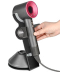 Dyson Supersonic Hair Dryer Stand With Aluminum Alloy Bracket And Power Plug Holder being used, black finish, custom fit
