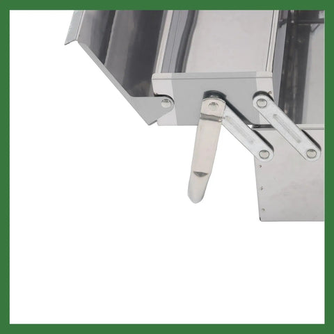 Close-up of Dang Tough Stainless Steel Tool Box With Rubberized Carry Handle 18 Inch showing slide-out tray and latch mechanism.