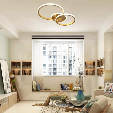 Modern LED Ceiling Light Flush Mount 106W With Six Ring Circle Design, gold acrylic chandelier in bright living room.