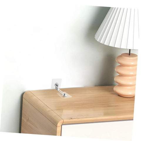 12 Piece Cabinet Anchors Heavy Duty Furniture Safety Straps installed on wooden dresser for anti tip childproofing