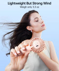 Mini Portable USB Rechargeable Handheld Fan, 3 Speeds, Cute Pink Travel Companion, woman enjoying breeze, close-up view