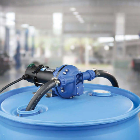 Heavy Duty 12 Volt Def Transfer Pump Handles 8 Gpm Antifreeze Or Washer Fluid No Sweat Compatible With Water Based Solutions featuring hose barb connections on blue drum.