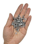 Hand holding 100 Pieces M4 0.7 Hex Nut Stainless Steel 304 18 8 Hexagon Nut For Bolts Bright Finish Full Thread High Temperature
