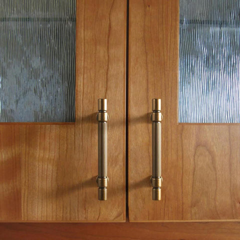 Vintage Retro Antique Brass Zinc Alloy Cabinet Handles 6 Pack With 5 Inch Center To Center Mounting Holes installed on wood cabinet