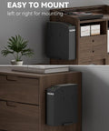 Lightning Fast Biometric Gun Safe For Bedside Handgun Storage Featuring Quick Draw Sliding Door Design And Foolproof Fingerprint Scanner For Super Secure Home Defense Setup mounted on a bedside dresser.
