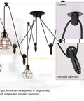 Five Head Adjustable Industrial Pendant Light With Vintage Spider Design installation showing pulleys and pendant hammers.