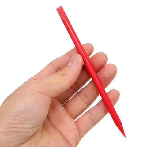 Red Movement Installation Rod For Watches And Dial Repair Cleaning Sticks ABS Plastic Double End Watchmaking Tool in hand view