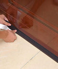 Applying neoprene weather stripping roll 4 inch wide 10 foot long one quarter inch thick with self adhesive backing for doors