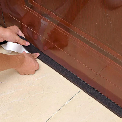 Applying neoprene weather stripping roll 4 inch wide 10 foot long one quarter inch thick with self adhesive backing for doors