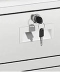 Close-up of the lock mechanism with keys on a Kickass Heavy Duty Stainless Steel Workbench Setup for Office or Commercial Kitchen.