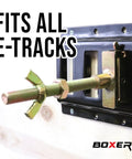 Close-up of a Beefy E Track Heavy Duty Spare Tire Mount 5 Inch Bolt Hanger For Enclosed Trailers Trucks Semis And Garages 2 Pack Fits All Standard E Track And X Track Rails Keeps Your Spare Tire Secure And Ready mounted on an E-track rail, showing bolt and latch mechanism.