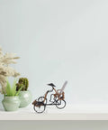 Killer Vintage Asian Rickshaw Driver Card Holder With Sleek Metal Body And Super Cool Rattan Detailing perfect for your desk, shown on shelf.