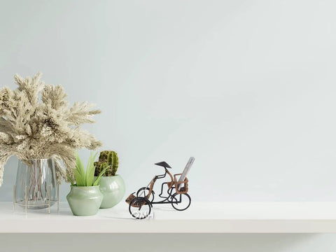 Killer Vintage Asian Rickshaw Driver Card Holder With Sleek Metal Body And Super Cool Rattan Detailing perfect for your desk, shown on shelf.