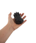 Hand holding a Dual End Engine Barring Socket Wrench Shop Tested For Cat 3200 And 3406 Series Engines, showing solid black material.