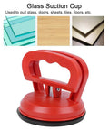 Heavy Duty Glass Suction Cup Lifter With Ergonomic Abs Handle And Tight Locking Mechanism For Moving Tiles Sheets And Panels Like A Boss With Unshakable Grip All Day Long, red design with handle and rubber base.