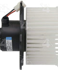 Top Shelf AC Blower Motor With Fan Wheel Plug And Play Auto Heating And Cooling System Replacement side view showing motor and fan wheel.