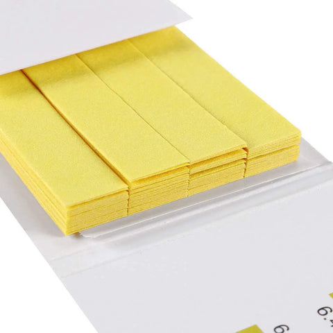 Close-up of yellow pH Test Strips 6.4 to 8.0 Indicator Paper Litmus Tester for Water, Food, Pool, and Aquarium Testing Kit, 55mm by 9mm