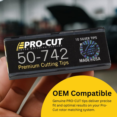 Hand holding box labeled 'PRO-CUT 50-742 Premium Cutting Tips' for brake lathe systems, 10 pack, Made in USA.