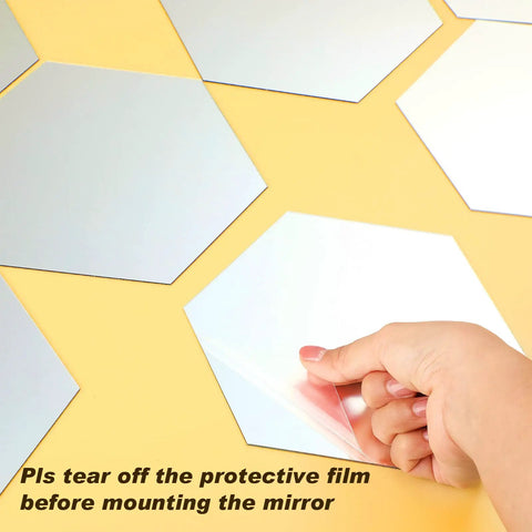 Peeling protective film from 24 Piece Dope Hexagon Mirror Wall Sticker Set, Removable Acrylic Honeycomb Mirrors For Living Room And Bedroom