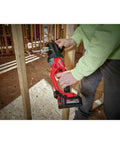 Person using Beast Mode Brushless M18 FUEL Hole Hawg Half Inch Cordless Right Angle Drill Tool Only for tight spaces