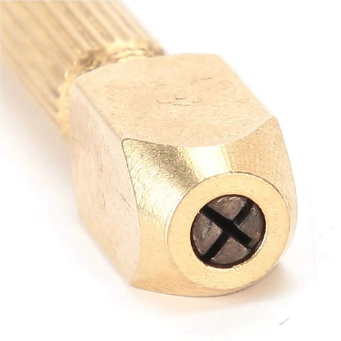 Close-up of Pin Vise Hand Drill With Replaceable Heads Non Slip Copper Handle On The Go Watch Tool for precision work