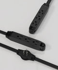 Black slim Three Prong 16 Foot Twin Extension Cord With Six Outlets Slim Design For Space Saving Cable Management Behind Sofas TVs Beds And Desks