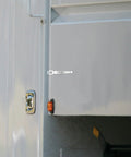 Heavy Duty Stainless Steel Toggle Latch Clamp For Truck And Trailer Doors secured on a truck door with a keyhole lock.