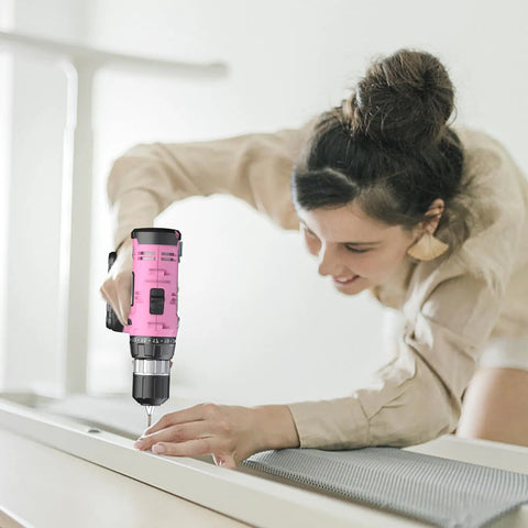 Woman using Pink Go To Cordless Drill Kit With 20V Battery And Charger 30 Nm Torque 21 Plus 1 Clutch Three Eighths Inch Keyless Chuck