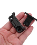 Hand holding a piece from 12 Pack Adjustable Cabinet Fasteners With Push In ABS Base And Panel Clips For No Tools Needed Installation