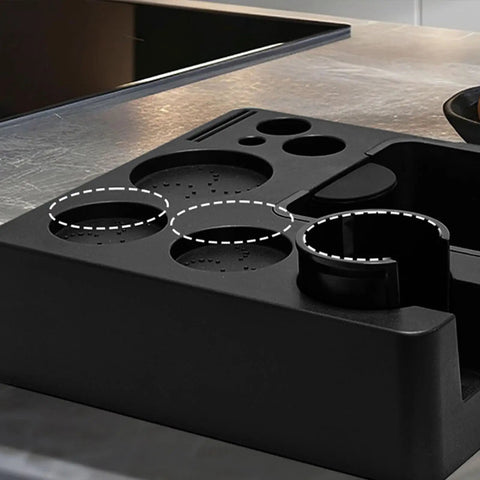 Built Tough Coffee Tamper Station And Espresso Organizer Box with predefined slots for 51mm, 54mm, 58mm baskets on kitchen counter.